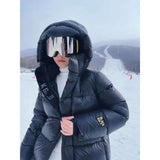 Clara - Cappotto lungo in piume