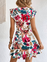 Flora – Abito stampato floreale con volant, casual ed elegante