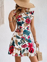 Flora – Abito stampato floreale con volant, casual ed elegante